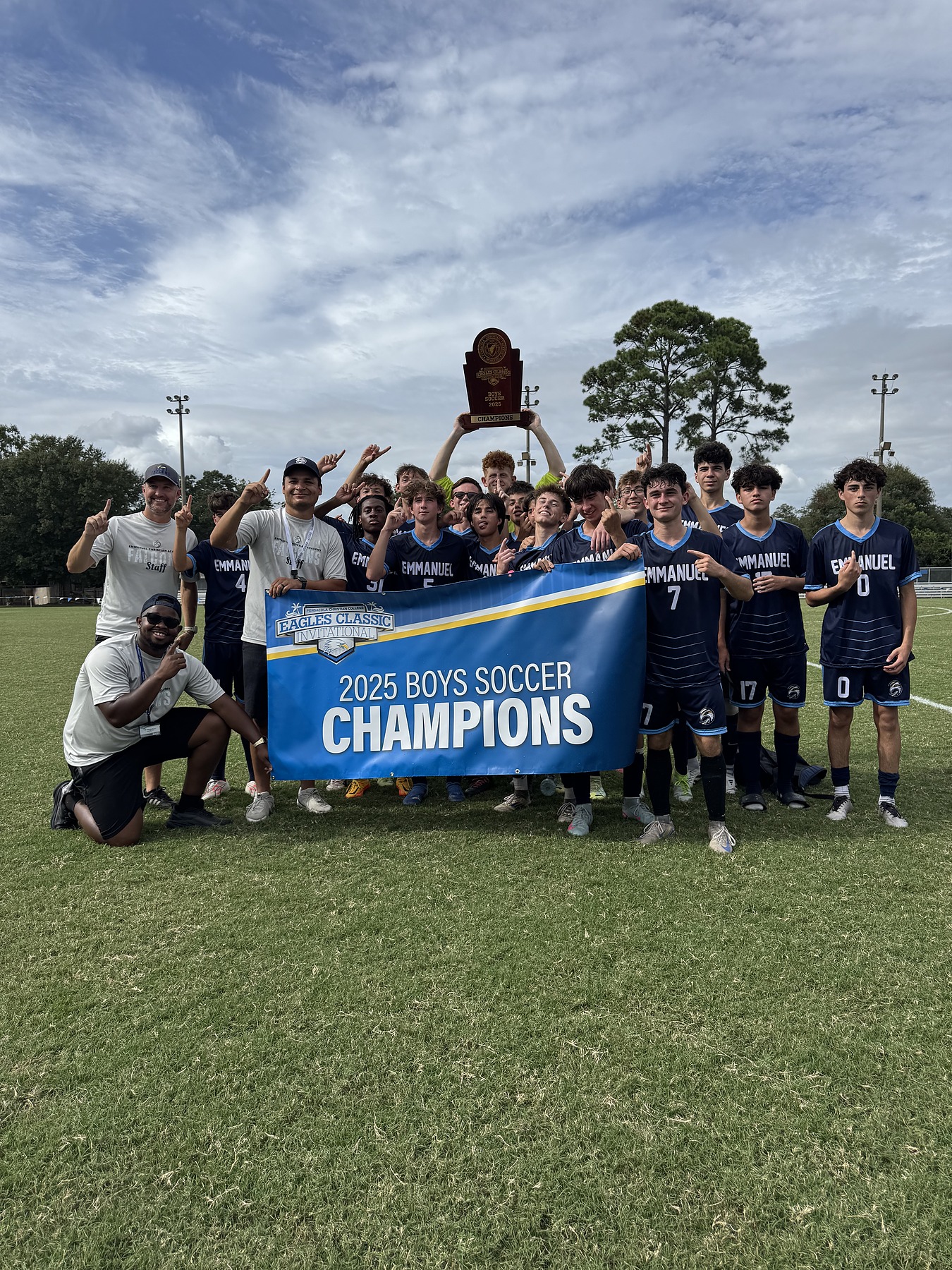 Emmanuel Christian Academy Falcons celebrating the 2025 Eagles Classic Invitational boys soccer championship
